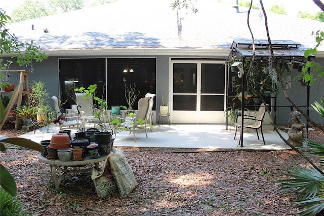 rear view of house with a patio area