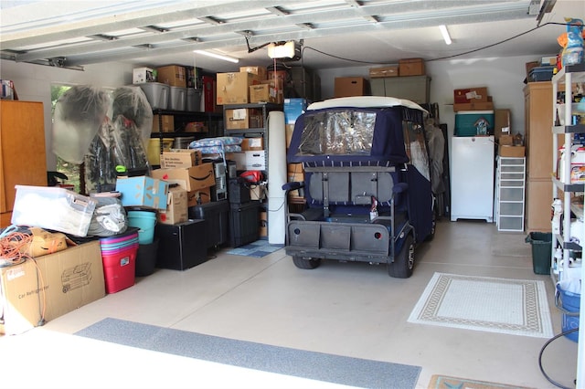 garage featuring a garage door opener