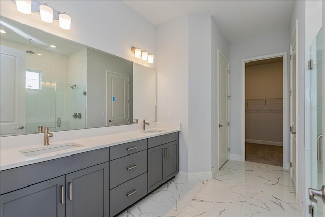 bathroom with vanity and an enclosed shower