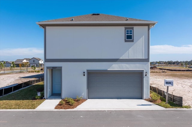 exterior space with a garage