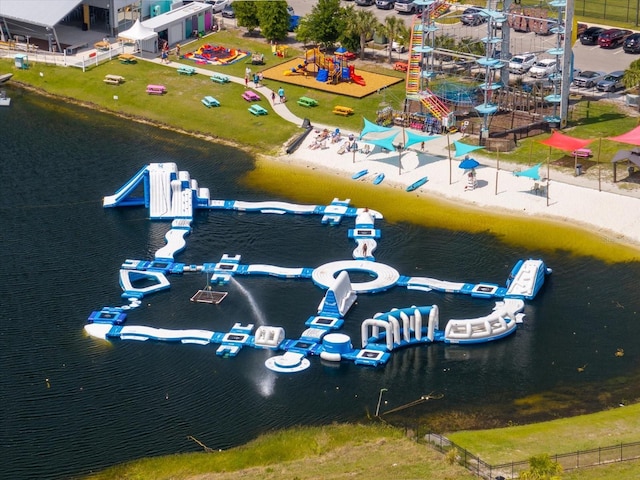 birds eye view of property featuring a water view