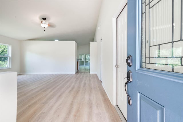 entrance foyer featuring ceiling fan and light wood-type flooring