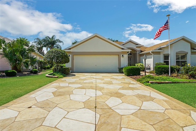 ranch-style home with a garage and a front yard