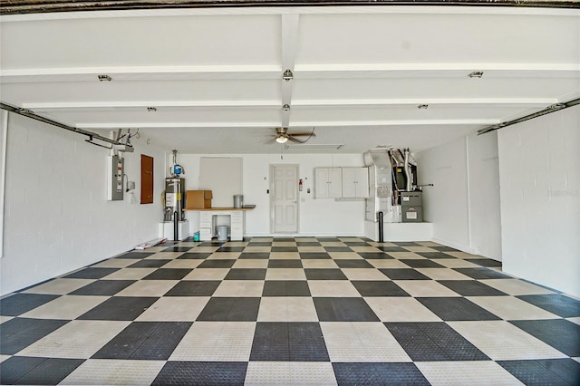 garage with water heater and ceiling fan