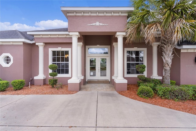 doorway to property featuring french doors