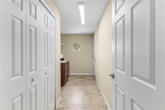 hallway with light tile flooring