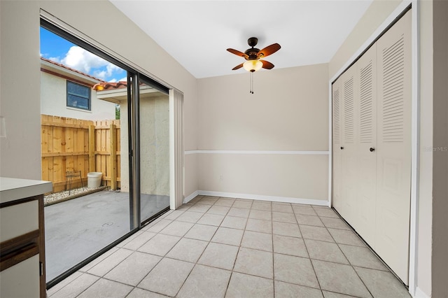 interior space featuring ceiling fan