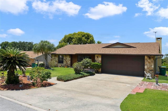 ranch-style house with a garage and a front yard