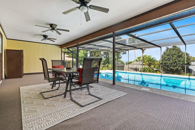 view of pool featuring ceiling fan