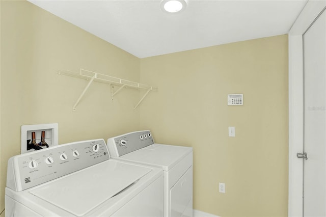 laundry area featuring independent washer and dryer