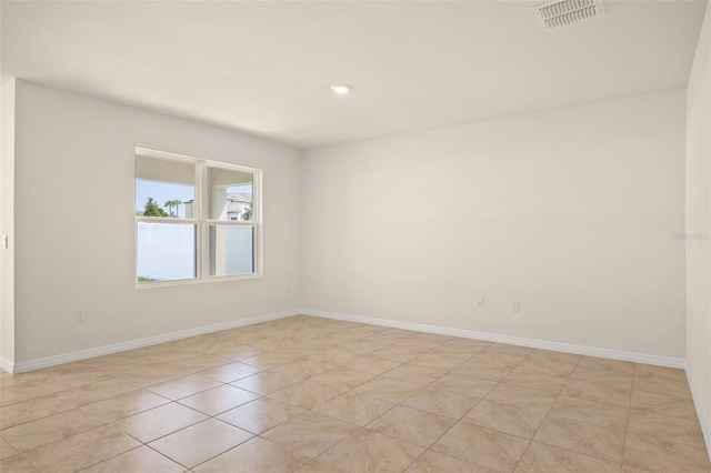 view of tiled spare room