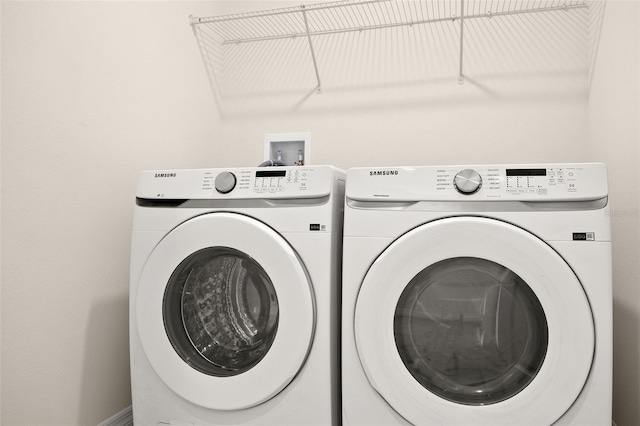 laundry area featuring washer and clothes dryer