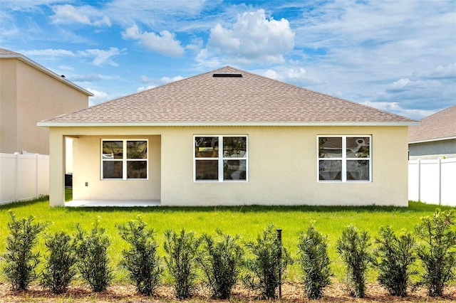 rear view of house with a patio area