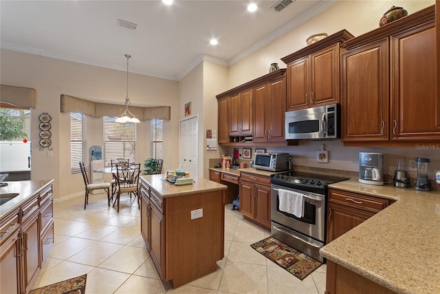 kitchen with a chandelier, a kitchen island, appliances with stainless steel finishes, light tile patterned floors, and crown molding