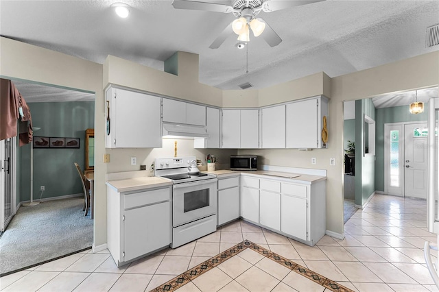 kitchen featuring white cabinetry, a textured ceiling, light carpet, electric range, and ceiling fan