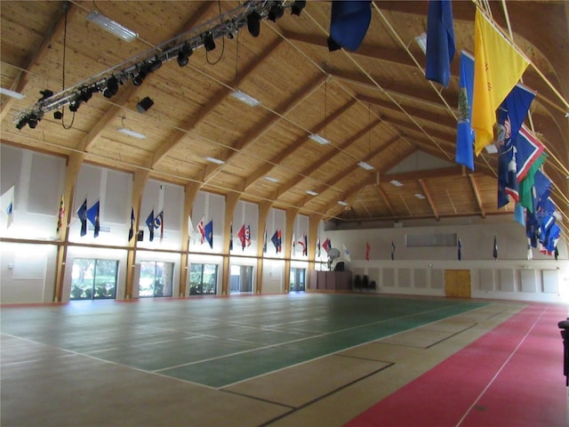 interior space with high vaulted ceiling and wood ceiling