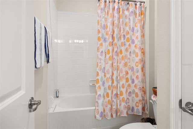 bathroom with shower / bathtub combination with curtain