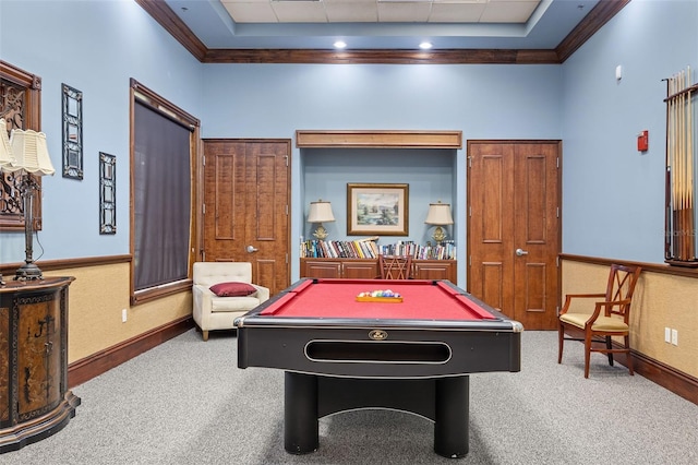 recreation room with a high ceiling, carpet flooring, billiards, and a raised ceiling