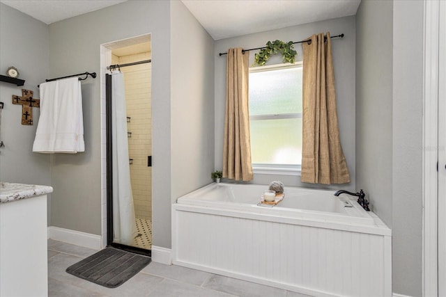 bathroom with tile patterned flooring and plus walk in shower