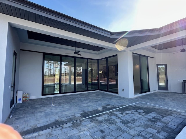 view of patio / terrace featuring ceiling fan