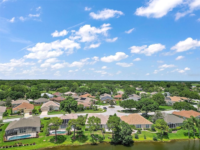 bird's eye view with a water view