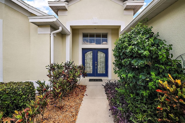 doorway to property featuring french doors