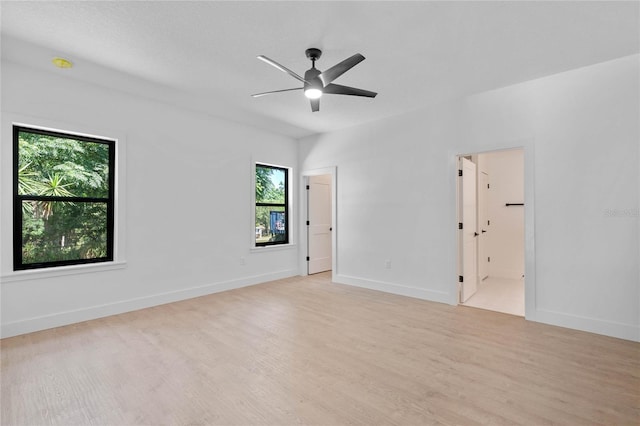 unfurnished room with ceiling fan and light hardwood / wood-style flooring