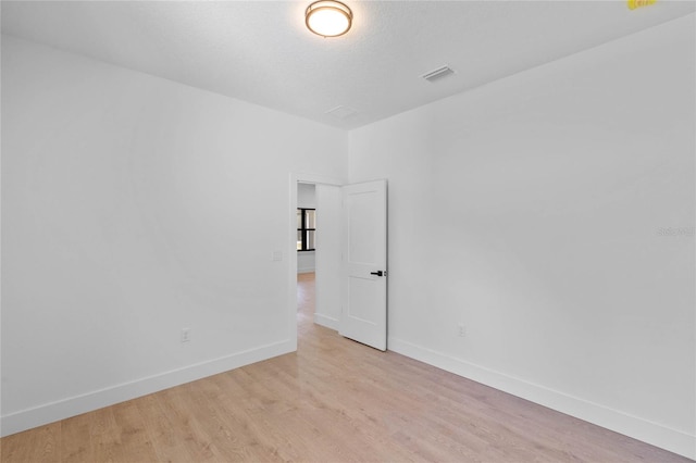 empty room featuring light hardwood / wood-style flooring