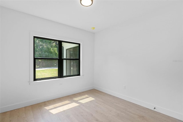 empty room with a healthy amount of sunlight and light wood-type flooring