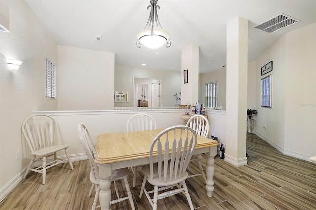 dining space with light wood-type flooring