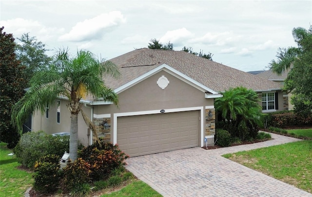 single story home with a garage