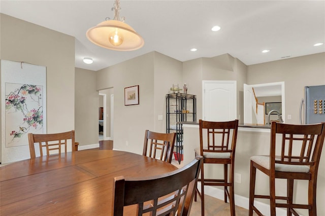 dining space with sink