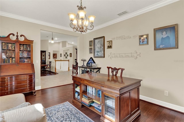 office area with dark hardwood / wood-style floors, a chandelier, and ornamental molding