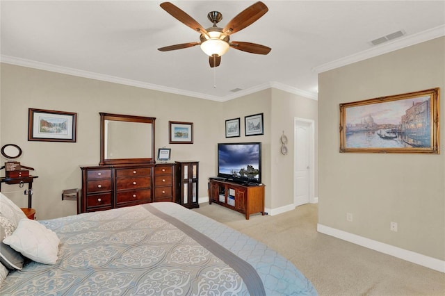 carpeted bedroom featuring ceiling fan and ornamental molding