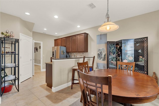 view of tiled dining space