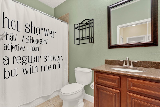 full bathroom with tile patterned floors, toilet, vanity, and shower / tub combo