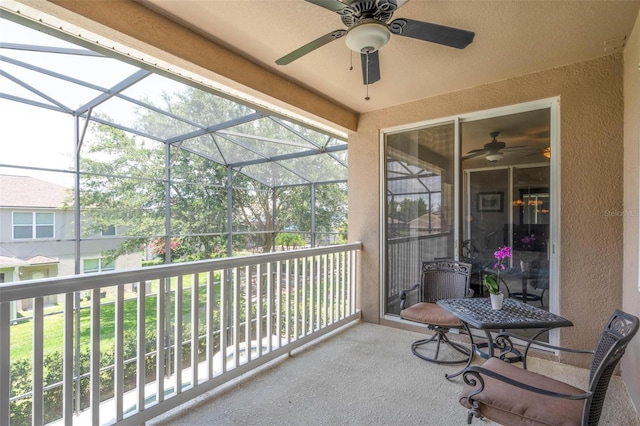 view of patio / terrace featuring ceiling fan and a balcony