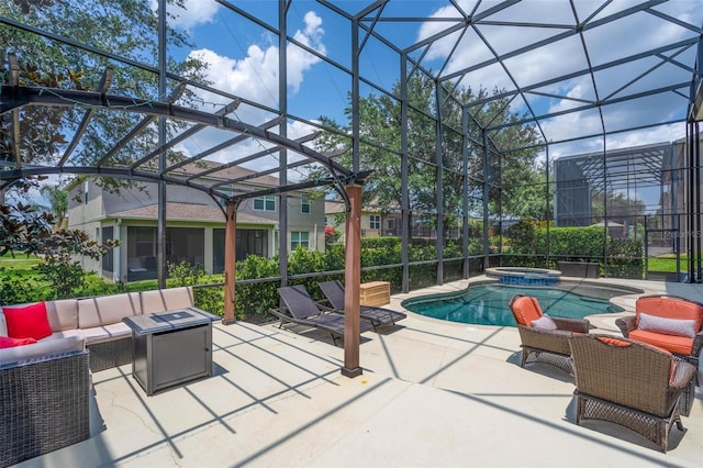 view of pool featuring an in ground hot tub, a lanai, an outdoor hangout area, and a patio