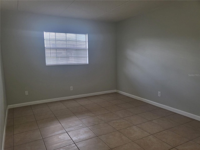 empty room with tile flooring