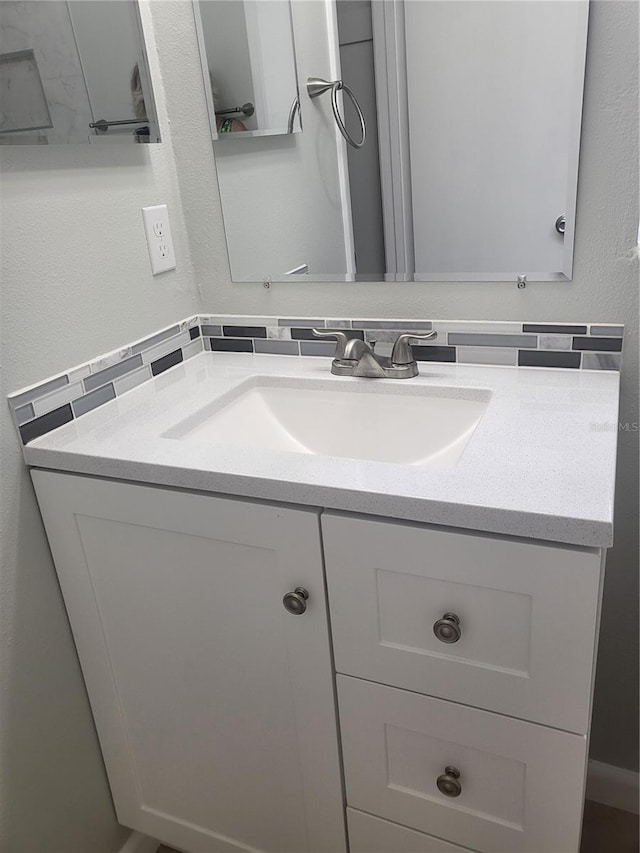 bathroom featuring oversized vanity