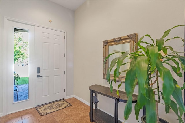 entryway featuring light tile patterned floors