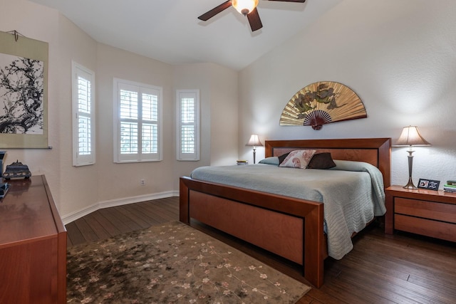 bedroom with ceiling fan and dark hardwood / wood-style flooring