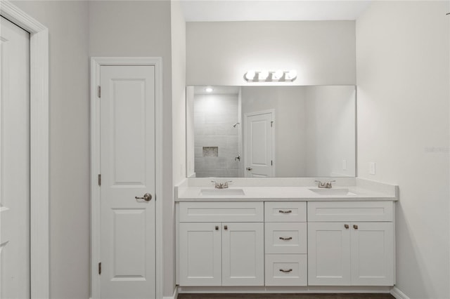 bathroom featuring vanity and walk in shower