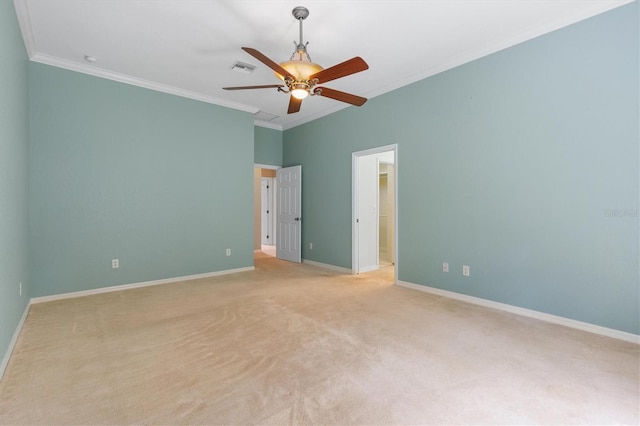 unfurnished bedroom with ceiling fan, crown molding, and light colored carpet