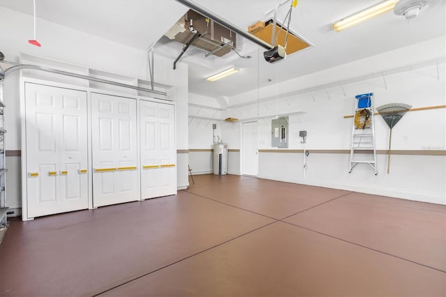 garage featuring a garage door opener, water heater, and electric panel