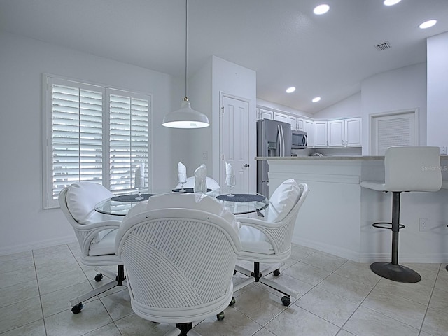 tiled office featuring lofted ceiling