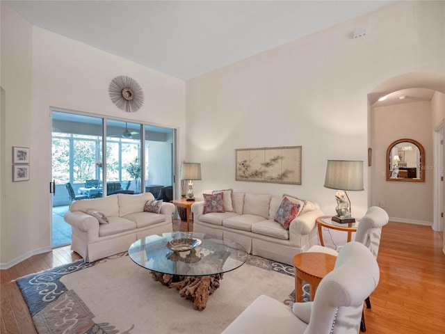 living room with light hardwood / wood-style flooring