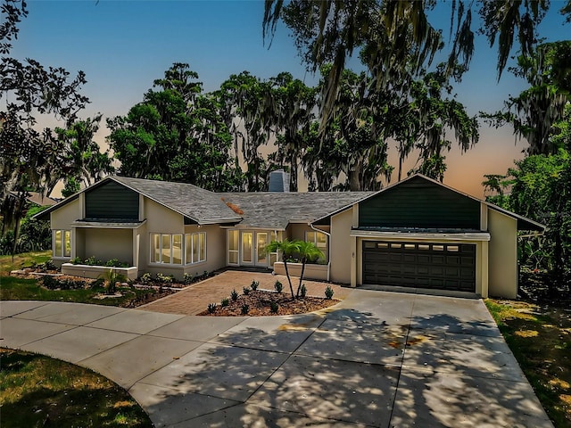 ranch-style house with a garage