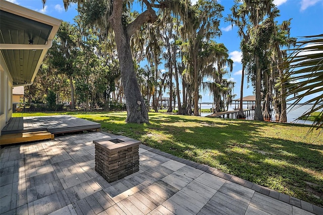 wooden deck with a yard