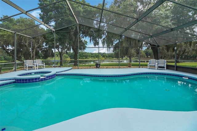 view of swimming pool with a lanai